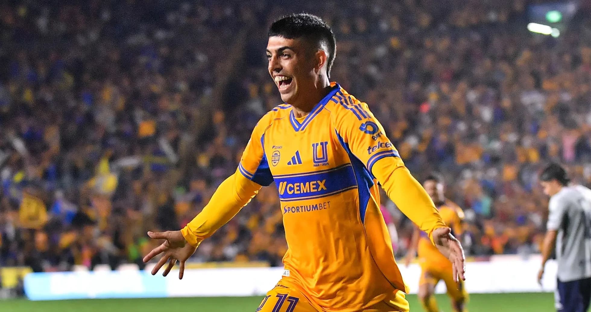 Player celebrating a goal for Tigres UANL Player celebrating a goal for Tigres UANL