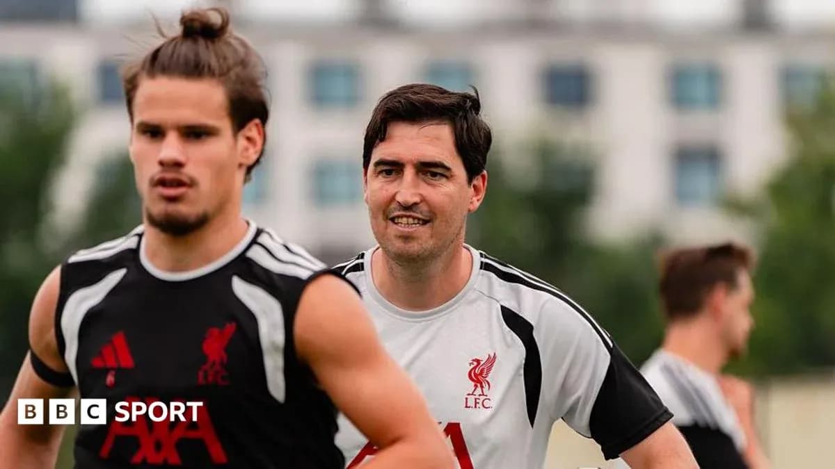 Liverpool players training on the pitch Liverpool players training on the pitch