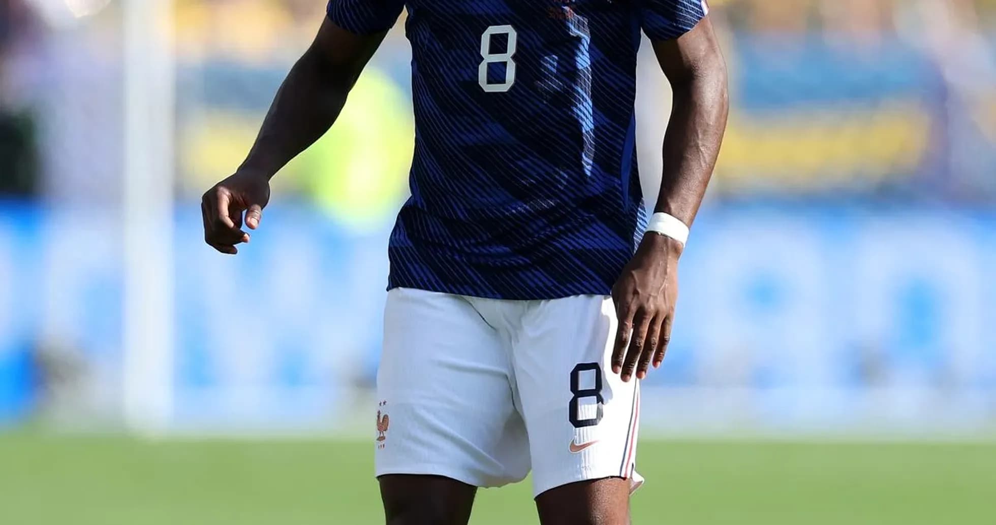 Player in France kit preparing to take a free kick Player in France kit preparing to take a free kick