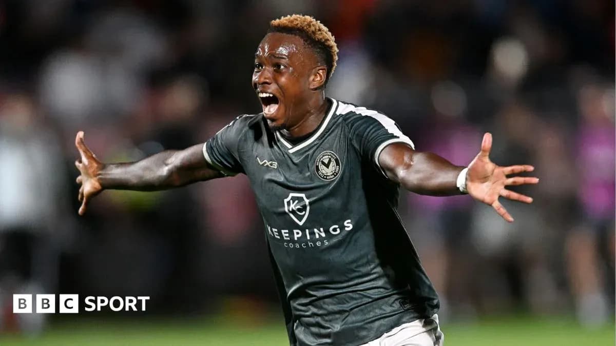 Player celebrating after scoring a goal Player celebrating after scoring a goal