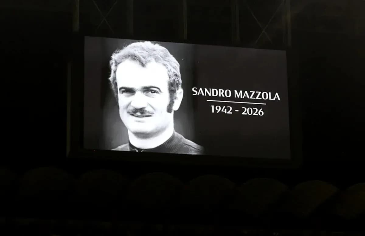 Tribute screen displaying Sandro Mazzola's image and years Tribute screen displaying Sandro Mazzola's image and years