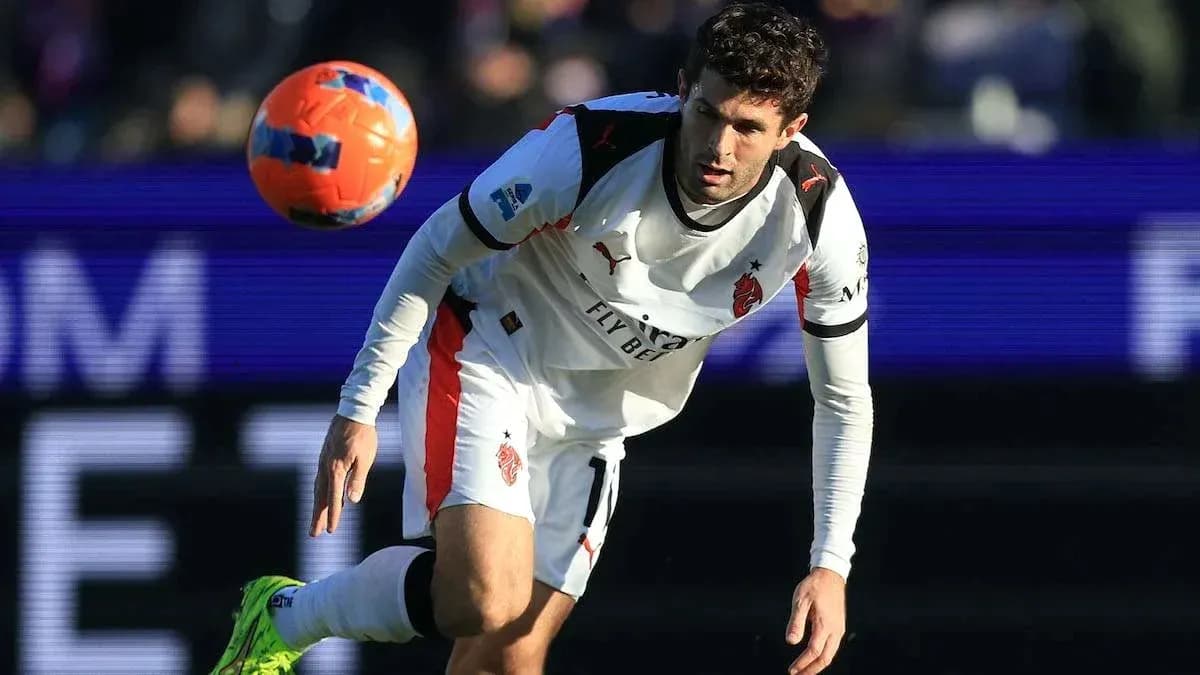 Player attempting to control a bouncing soccer ball Player attempting to control a bouncing soccer ball