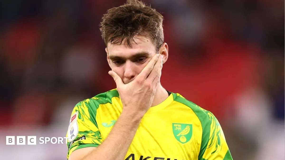 Player in yellow kit showing disappointment after match Player in yellow kit showing disappointment after match