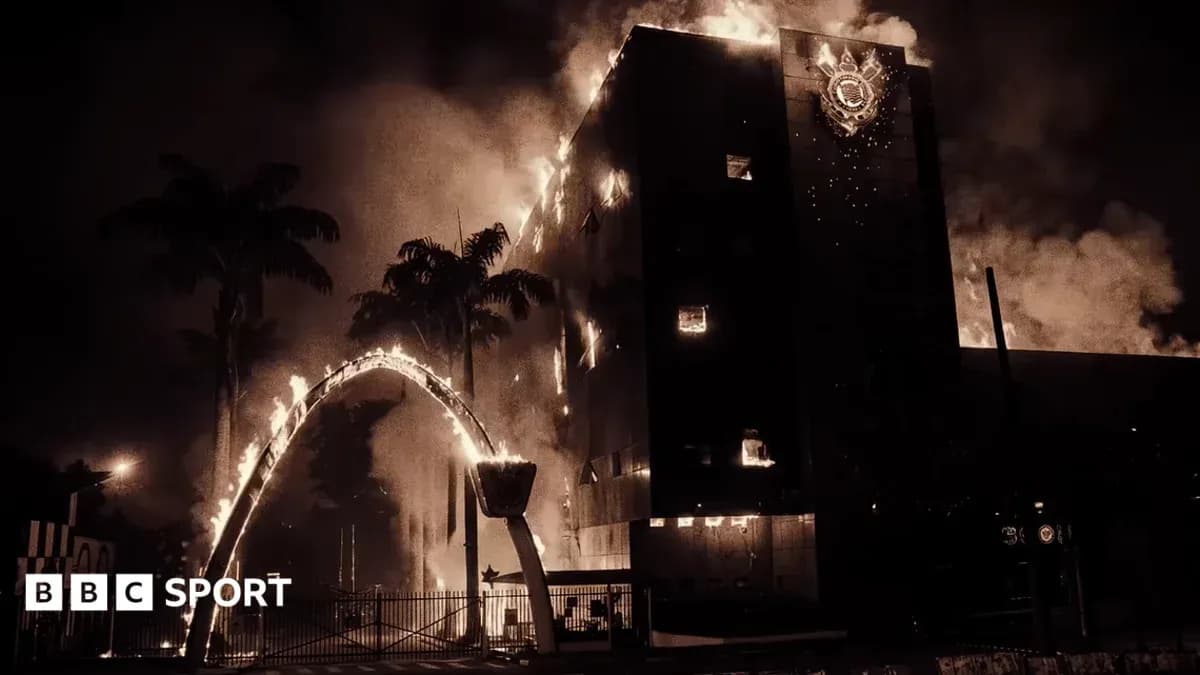 Building engulfed in flames with burning palm trees Building engulfed in flames with burning palm trees