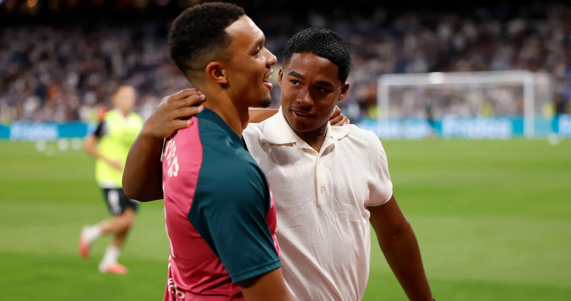 Two players sharing a moment on the pitch Two players sharing a moment on the pitch