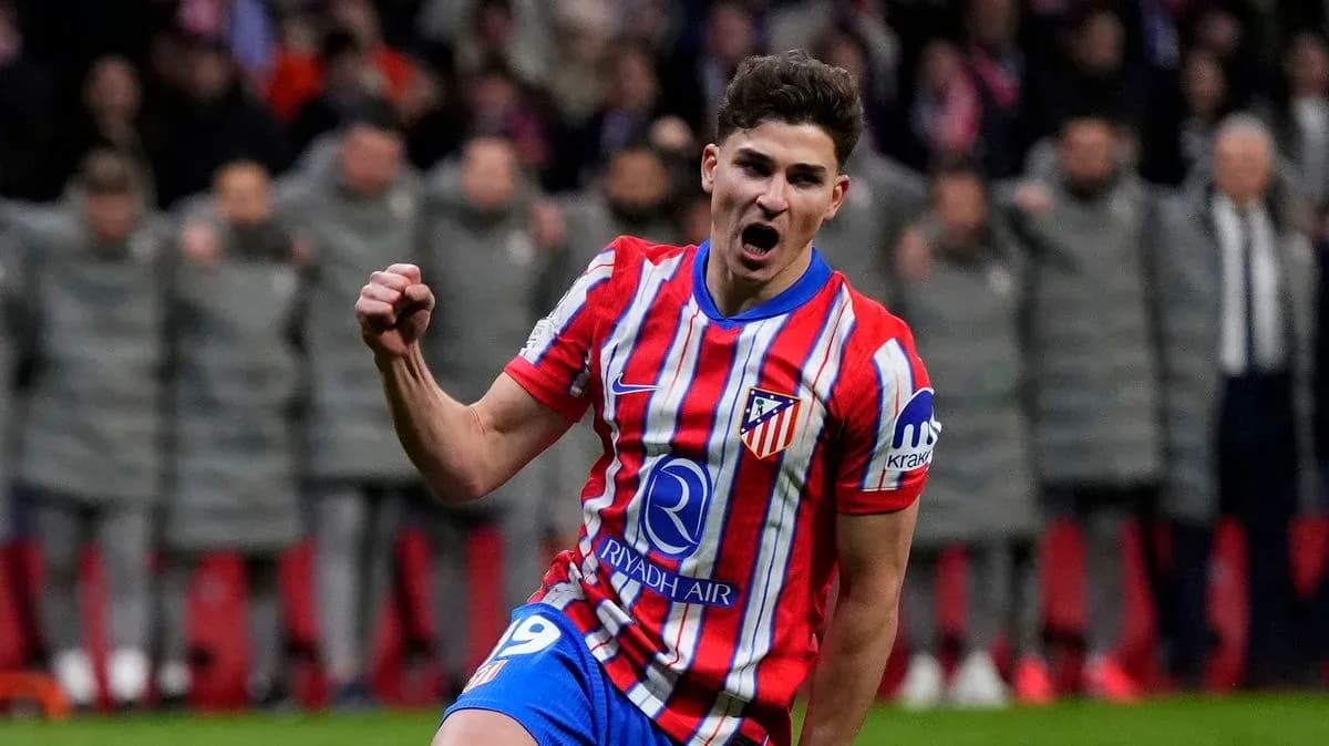 Player celebrating after scoring a goal for Atlético Player celebrating after scoring a goal for Atlético