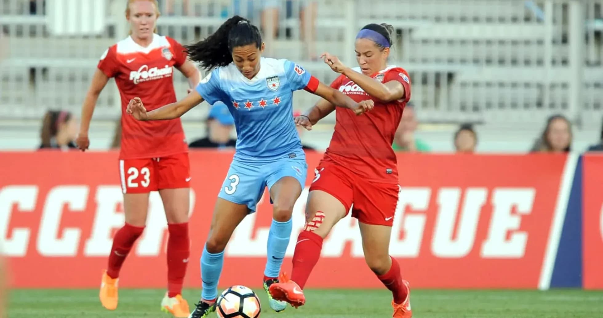 Chicago Red Stars player battling for possession Chicago Red Stars player battling for possession