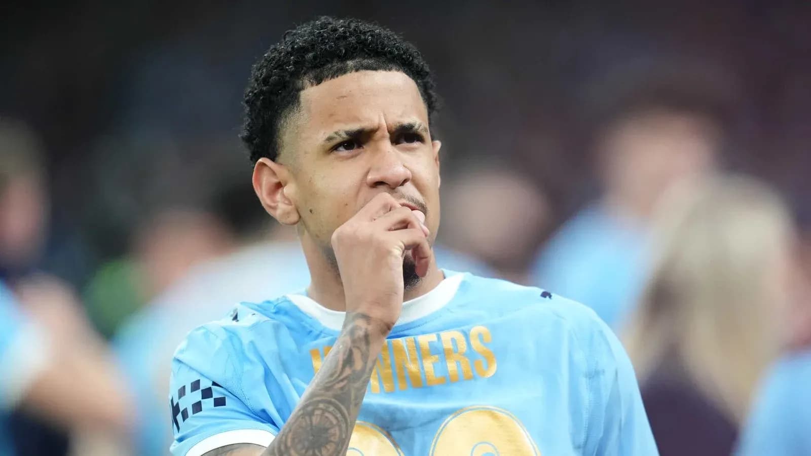 Player in blue jersey thinking during match Player in blue jersey thinking during match
