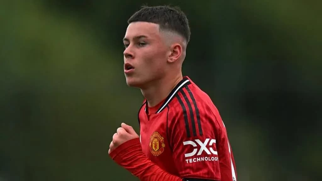 Player in red Manchester United kit during match Player in red Manchester United kit during match
