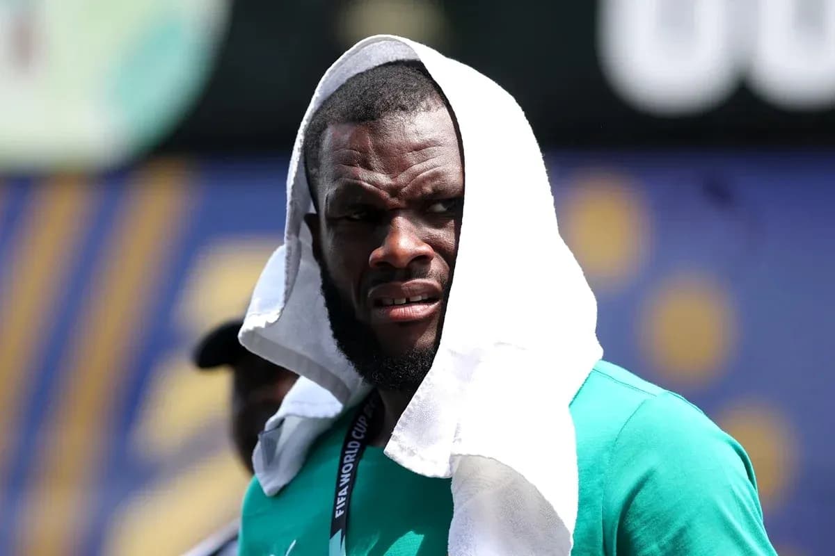 Athlete with towel on head during training session Athlete with towel on head during training session