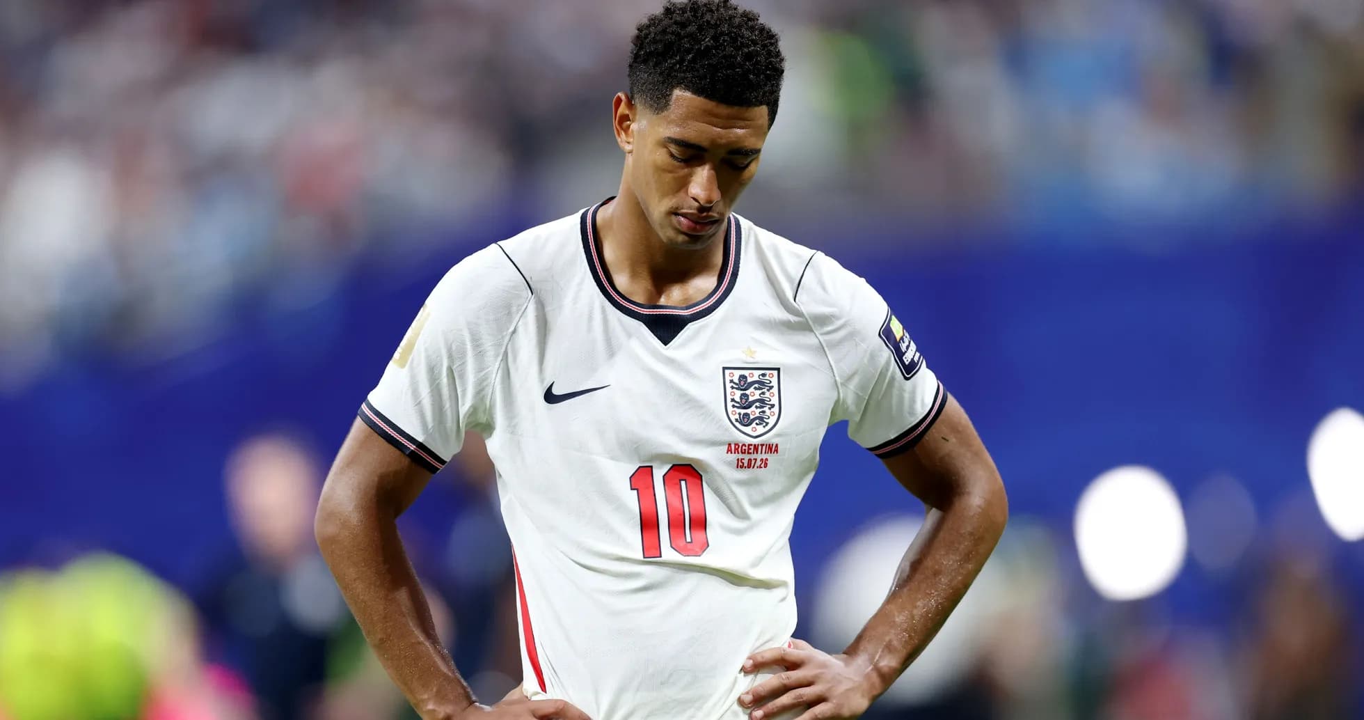 Player in England kit with head down during match Player in England kit with head down during match