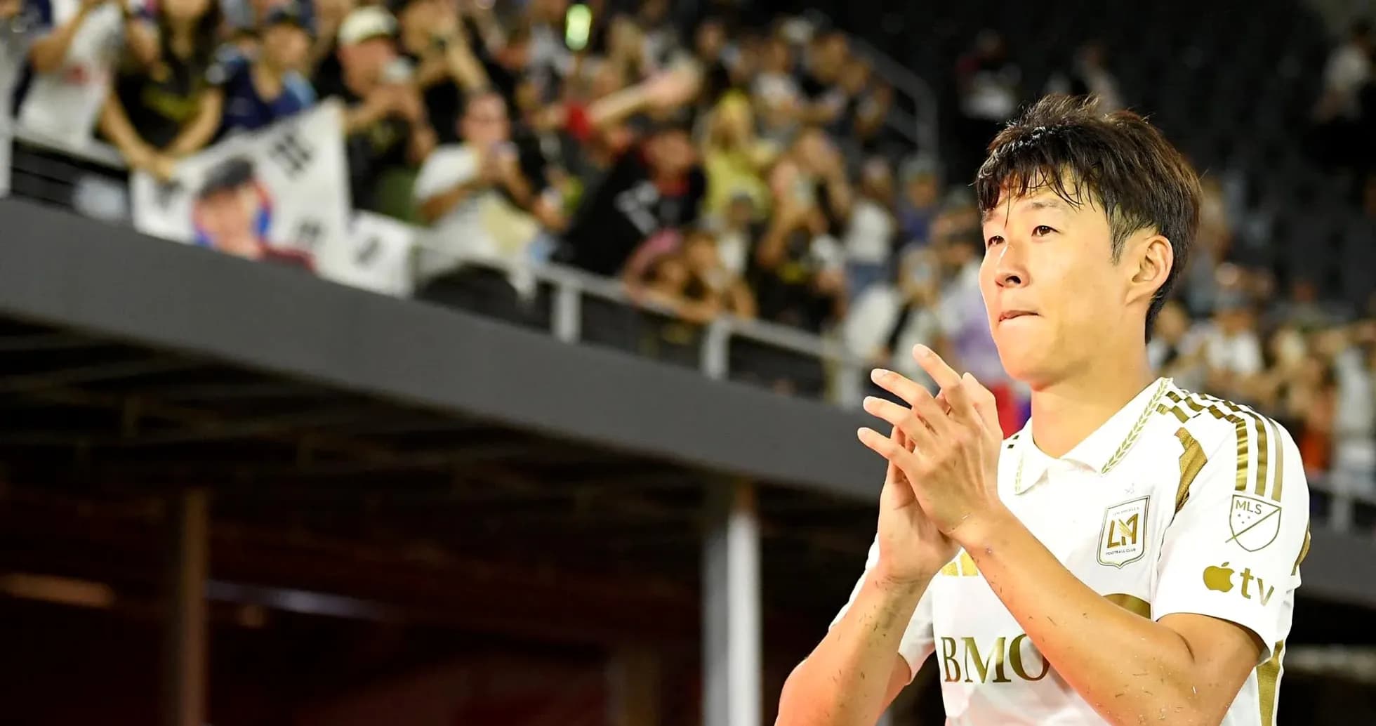 Player applauding fans during match at stadium Player applauding fans during match at stadium
