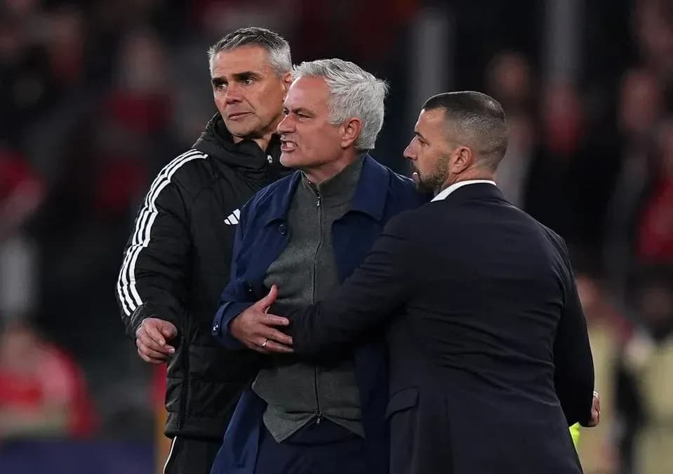 Manager being restrained by staff during heated moment Manager being restrained by staff during heated moment