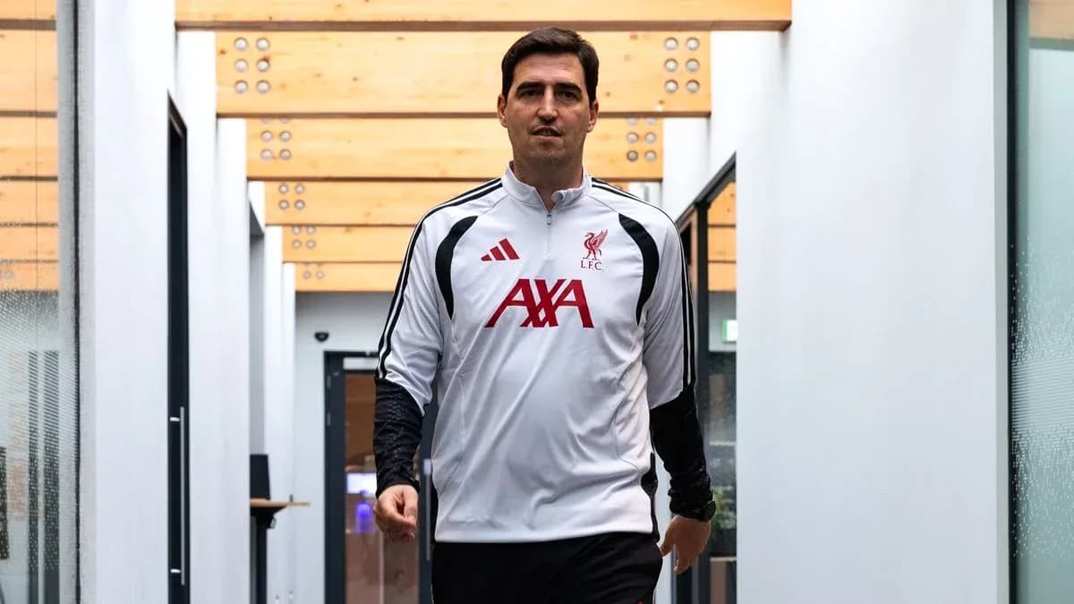 Goalkeeper walking in training facility hallway Goalkeeper walking in training facility hallway