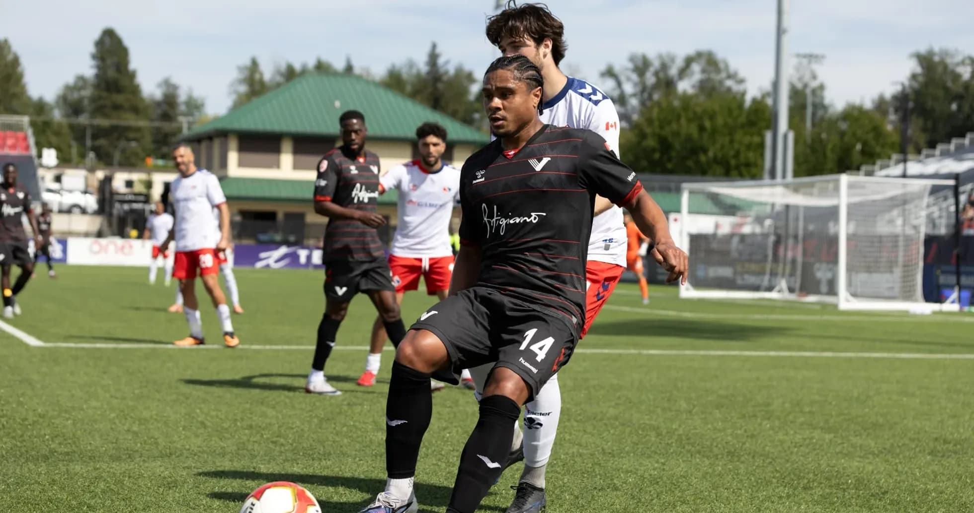 Vancouver FC player in action during match Vancouver FC player in action during match