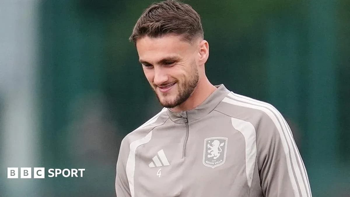 Player in Aston Villa training kit during session Player in Aston Villa training kit during session