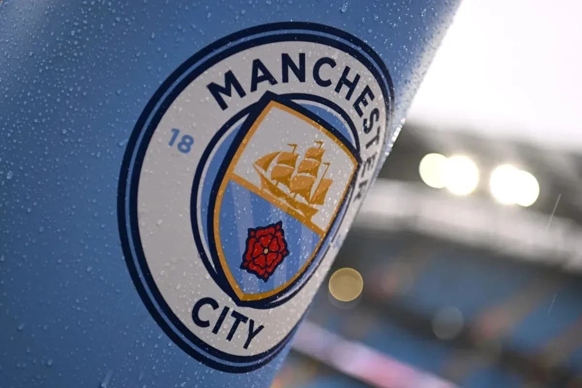 Close-up of Manchester City club logo with rain Close-up of Manchester City club logo with rain