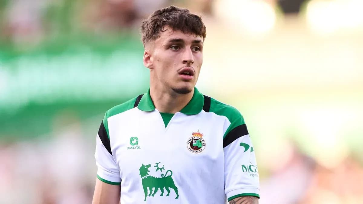 Player in white and green jersey on field Player in white and green jersey on field