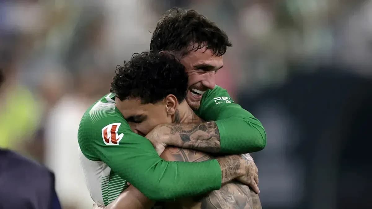 Two players embracing after a match celebration Two players embracing after a match celebration
