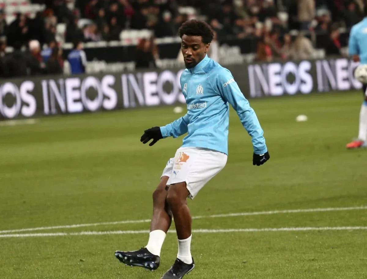 Player warming up on the pitch before match Player warming up on the pitch before match