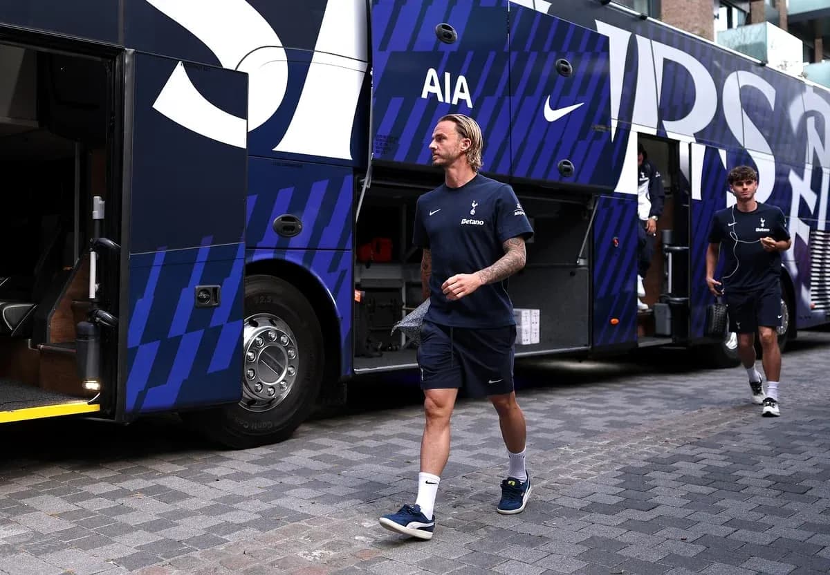 Tottenham players exiting team bus before match Tottenham players exiting team bus before match