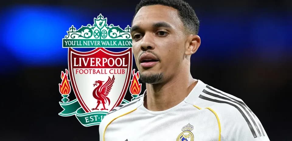 Player in white jersey with Liverpool logo background Player in white jersey with Liverpool logo background