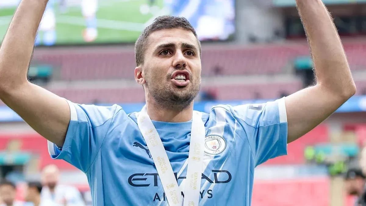 Player celebrating with medal after winning match Player celebrating with medal after winning match