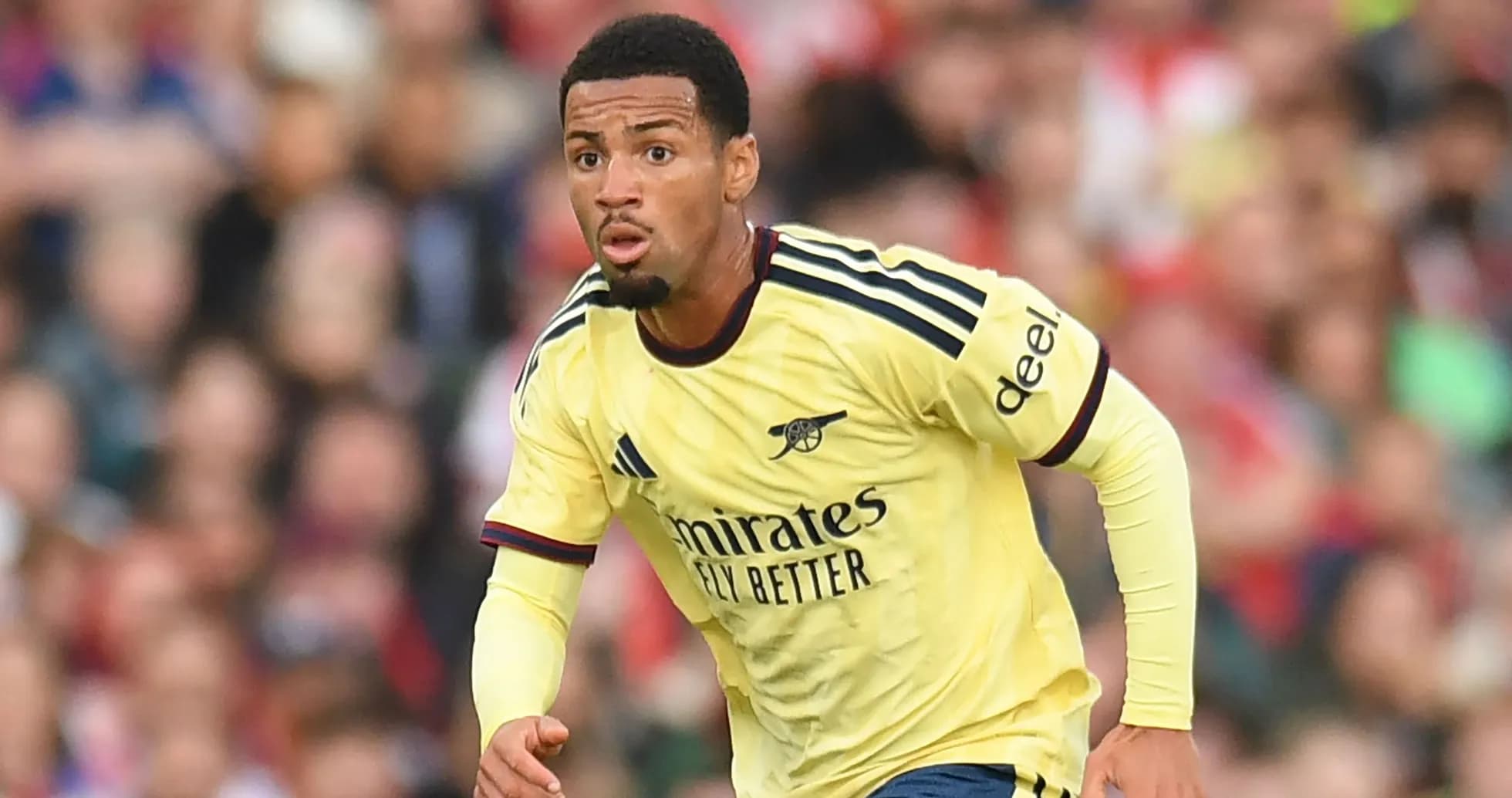 Arsenal player running during a match Arsenal player running during a match