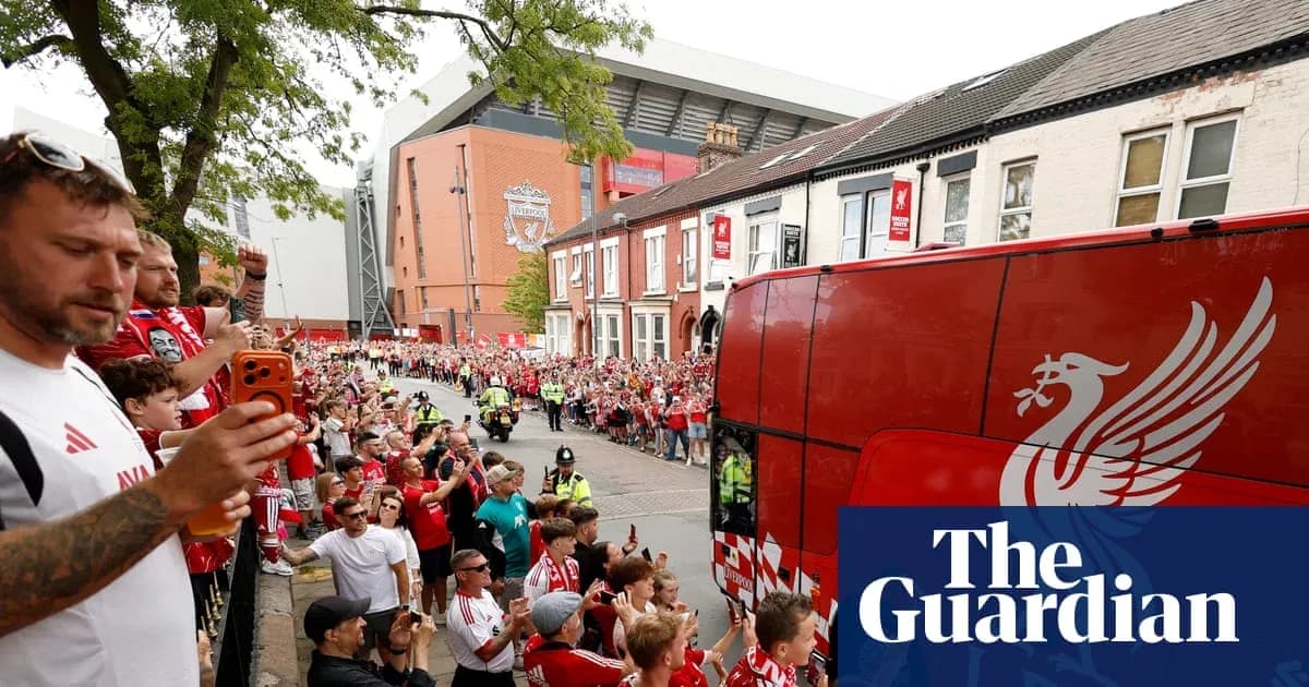Liverpool fans cheering as team bus arrives at Anfield Liverpool fans cheering as team bus arrives at Anfield