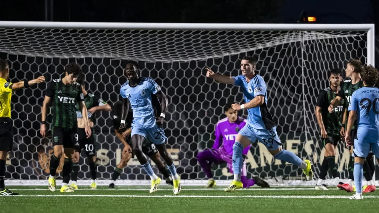 Players celebrating a goal in MLS Next Pro match Players celebrating a goal in MLS Next Pro match