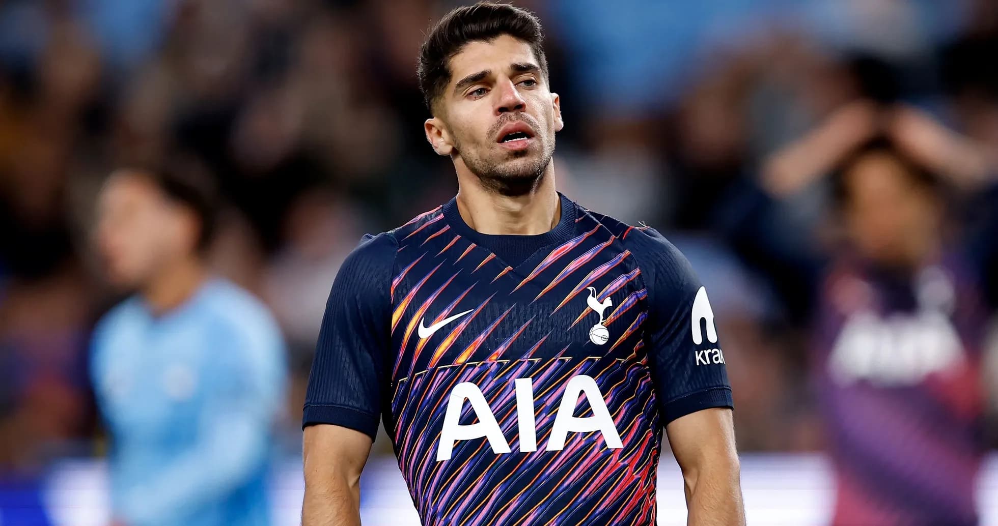 Tottenham player walking on the pitch during match Tottenham player walking on the pitch during match