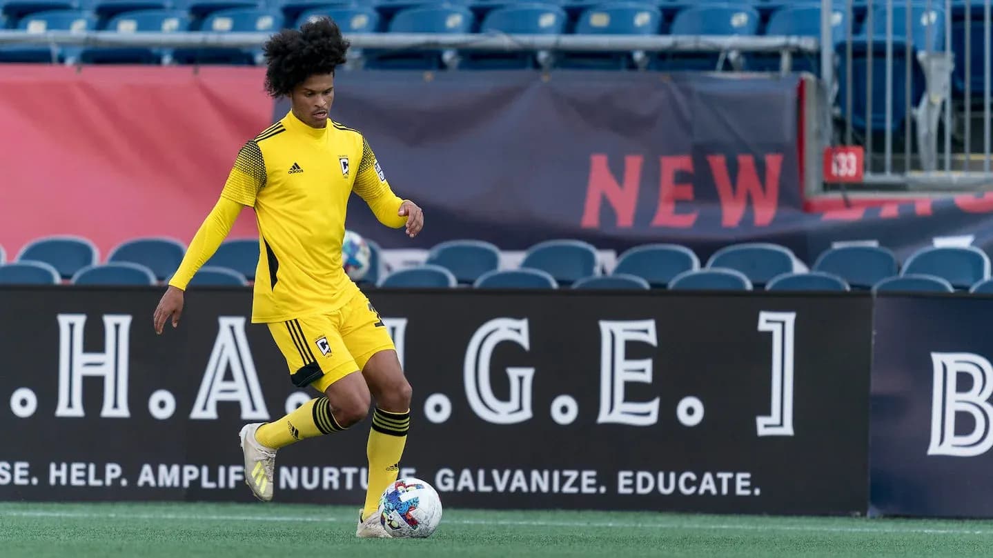 Player in yellow jersey during MLS Next Pro match Player in yellow jersey during MLS Next Pro match