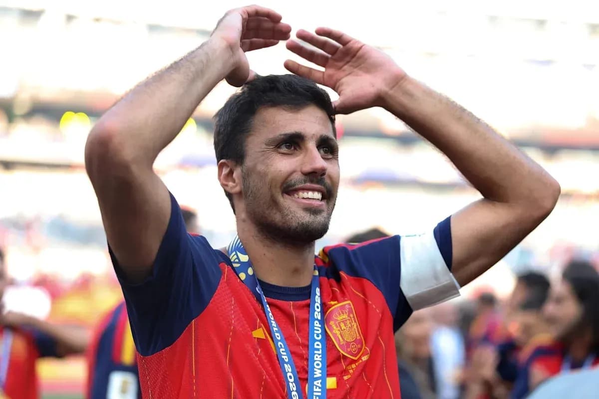 Player celebrating with arms raised after match Player celebrating with arms raised after match