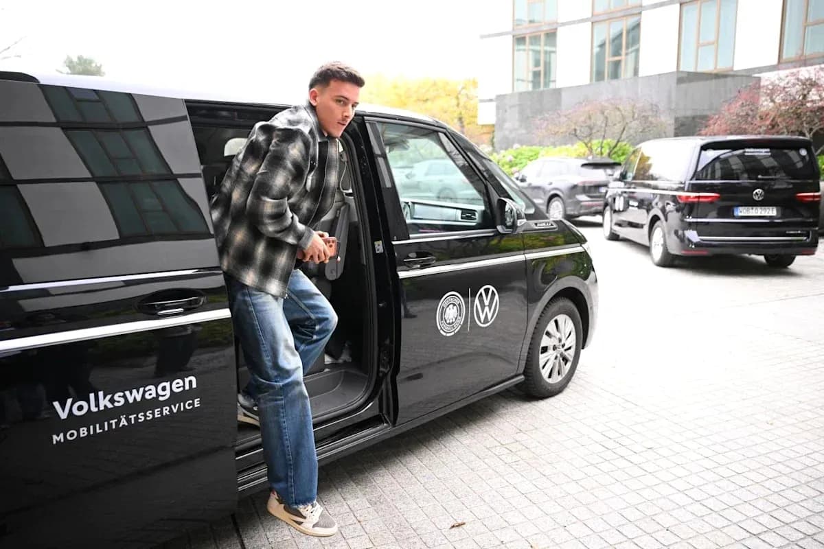 Player exiting Volkswagen vehicle at event location Player exiting Volkswagen vehicle at event location