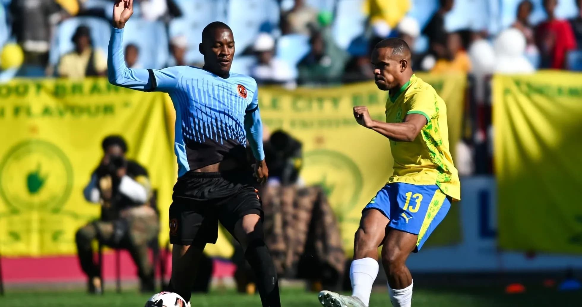Player dribbling the ball during a match Player dribbling the ball during a match
