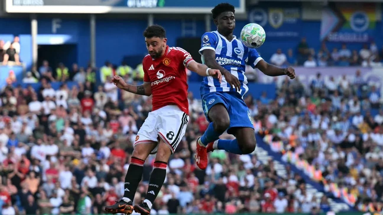 Player from Manchester United and Brighton contesting the ball Player from Manchester United and Brighton contesting the ball
