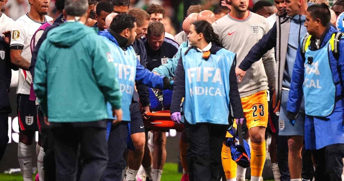 Medical staff transporting injured player off the field Medical staff transporting injured player off the field