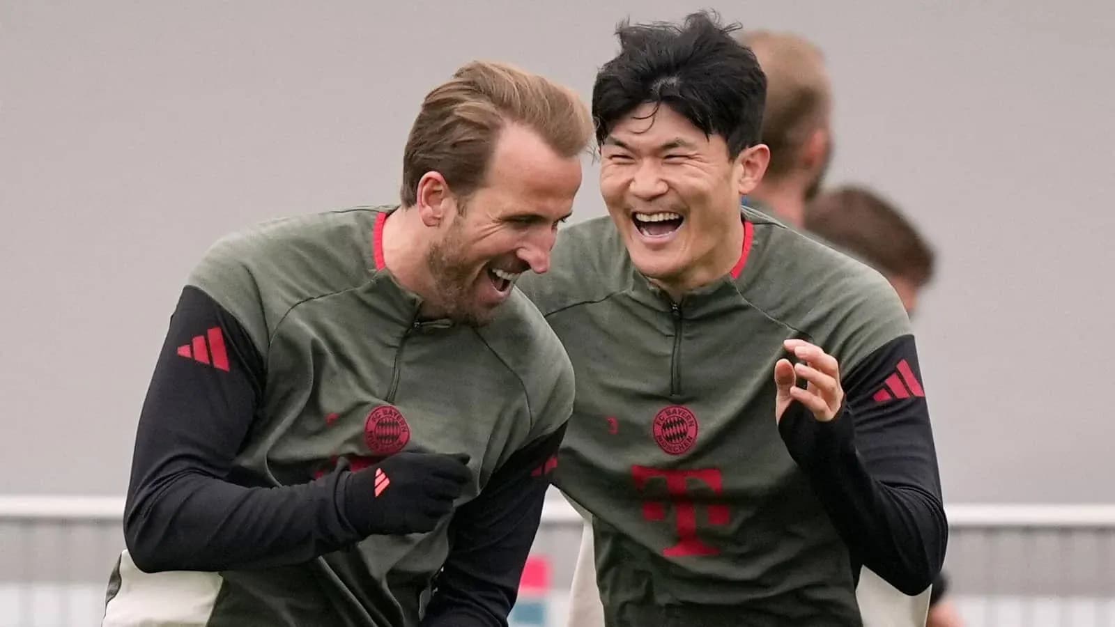 Players laughing during Bayern Munich training session Players laughing during Bayern Munich training session