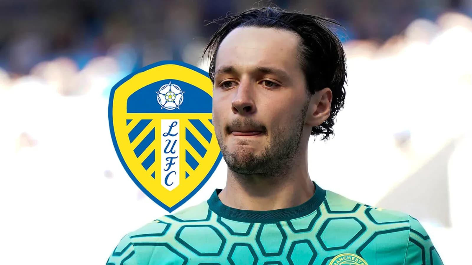 Goalkeeper in green jersey with Leeds United logo Goalkeeper in green jersey with Leeds United logo