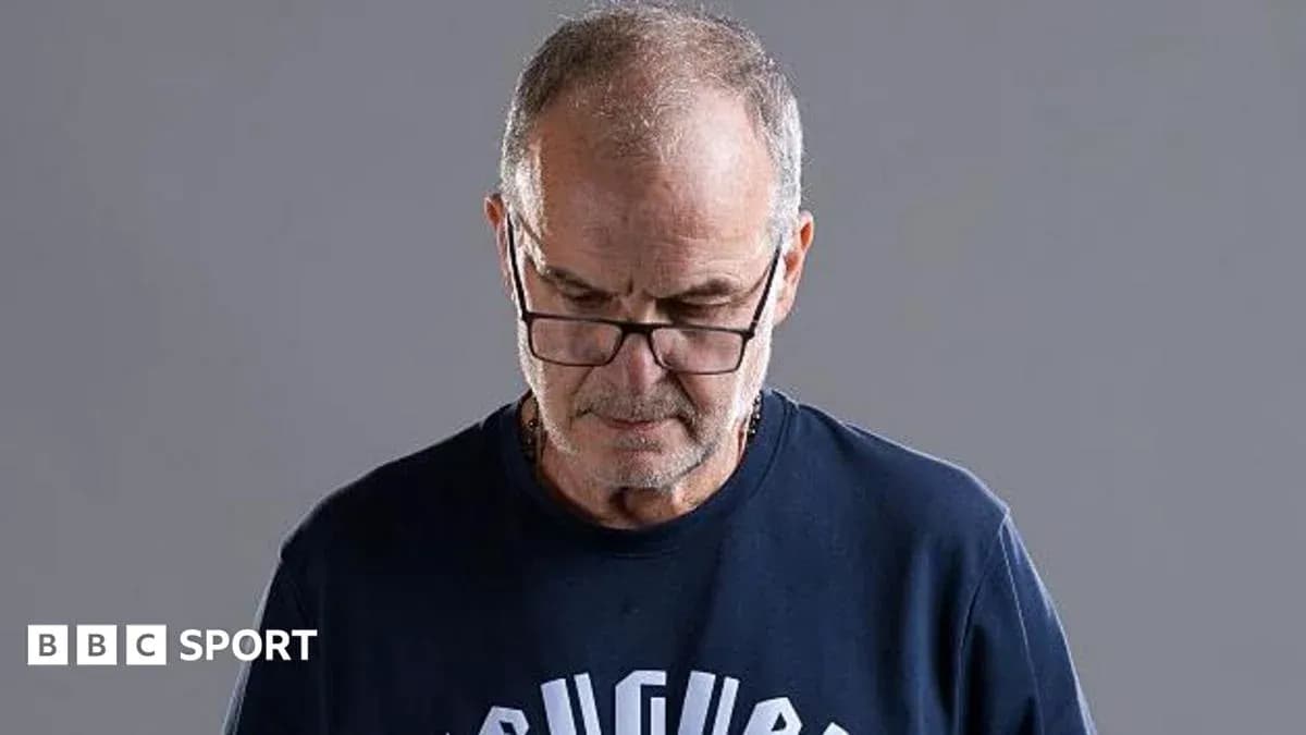 Man with glasses looking down thoughtfully Man with glasses looking down thoughtfully