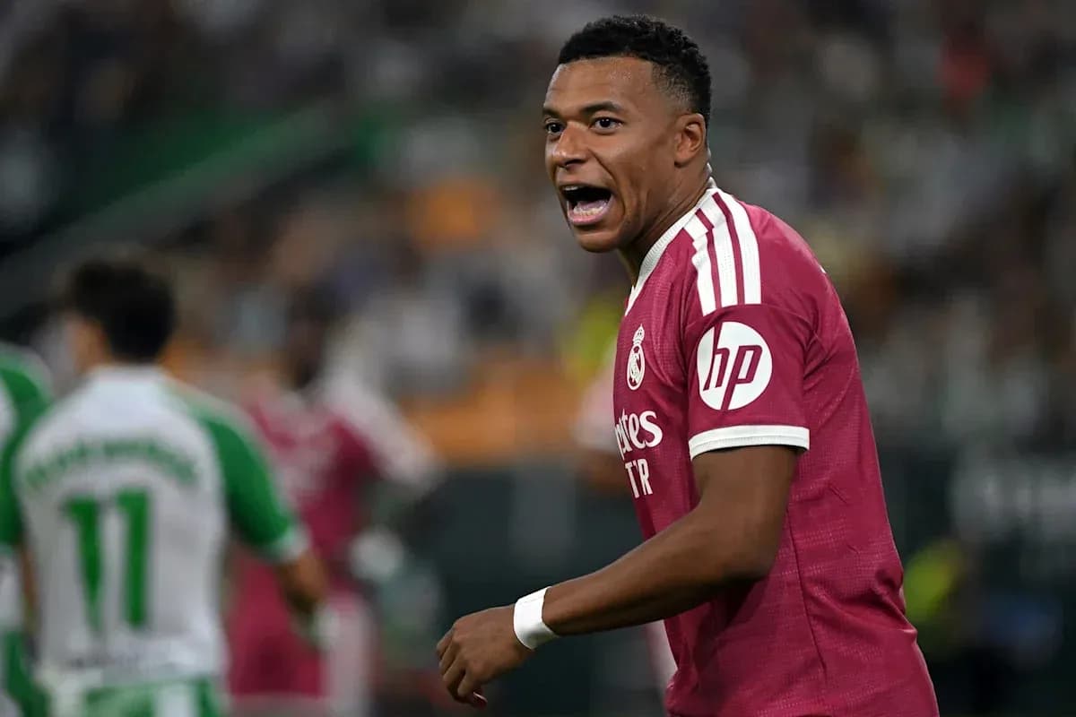 Player celebrating during a match in pink kit Player celebrating during a match in pink kit