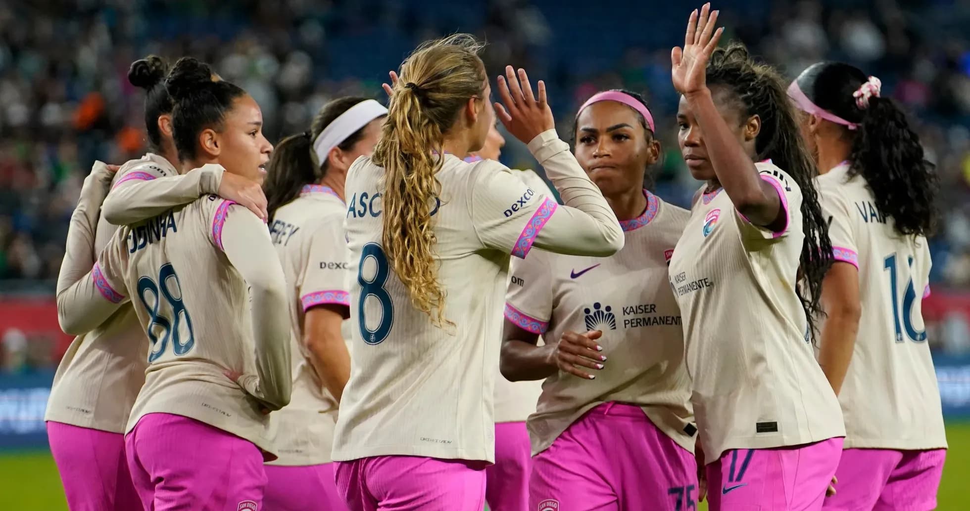 San Diego Wave players celebrating a goal San Diego Wave players celebrating a goal
