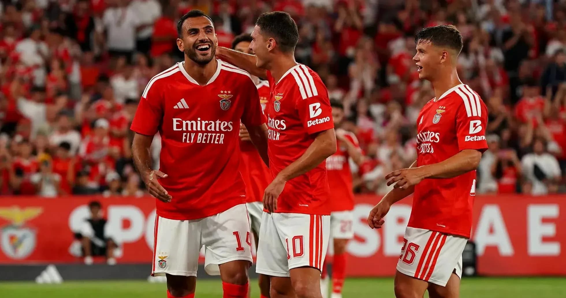 Benfica players celebrating during a match Benfica players celebrating during a match