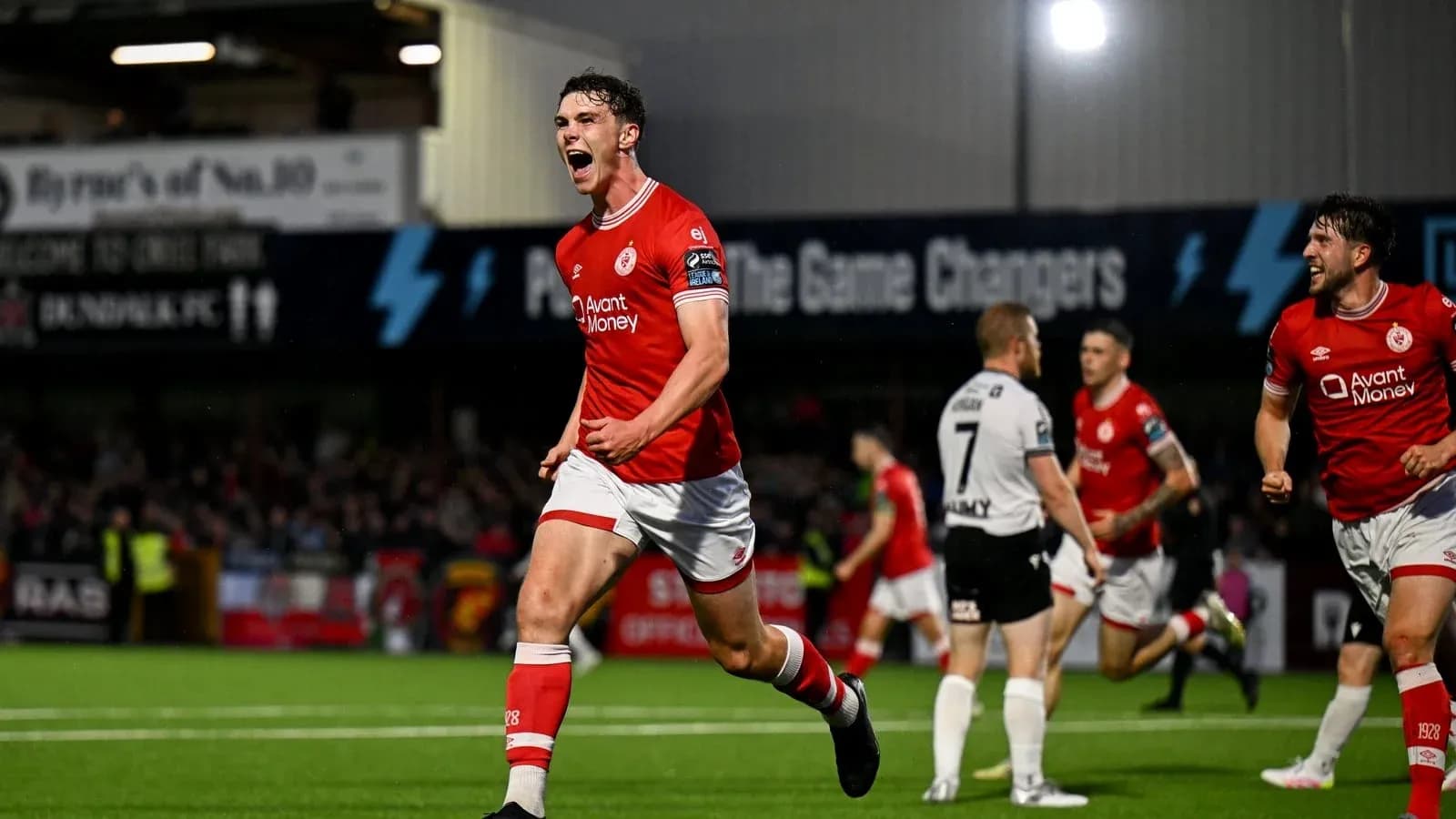 Player celebrating a goal during a match Player celebrating a goal during a match