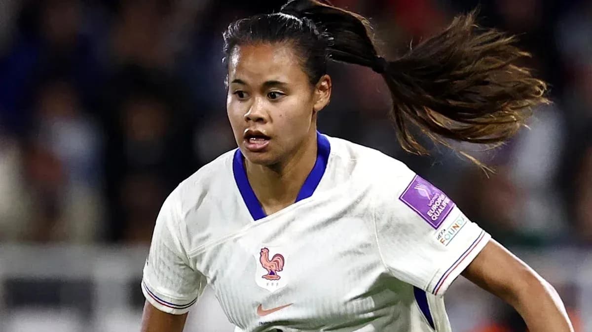 Player in white jersey sprinting during match Player in white jersey sprinting during match