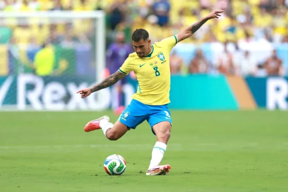 Brazilian player striking soccer ball during match Brazilian player striking soccer ball during match