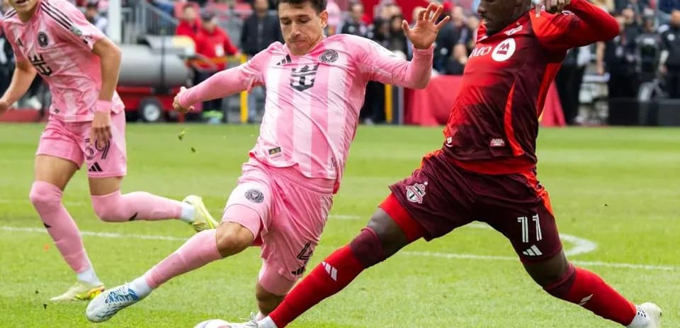 Inter Miami players challenging Toronto FC during match Inter Miami players challenging Toronto FC during match