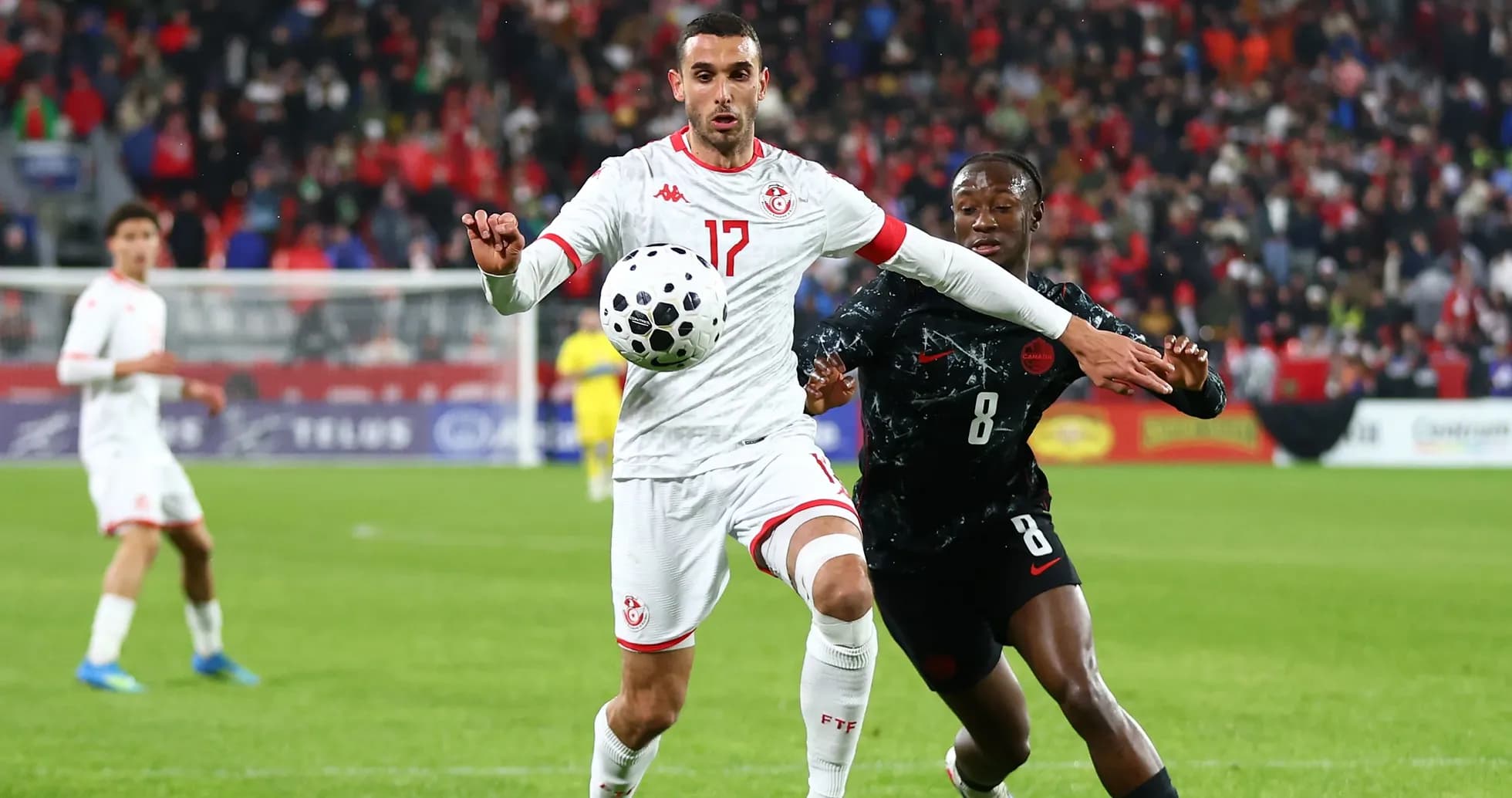 Player controlling the ball during competitive match Player controlling the ball during competitive match