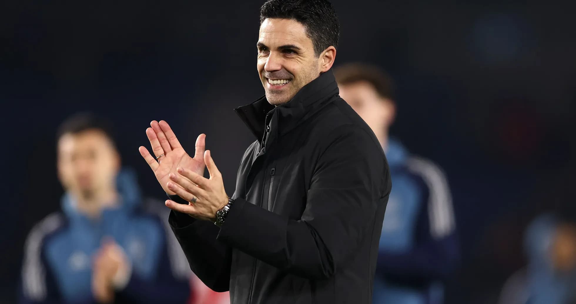 Manager clapping and smiling during match celebration Manager clapping and smiling during match celebration