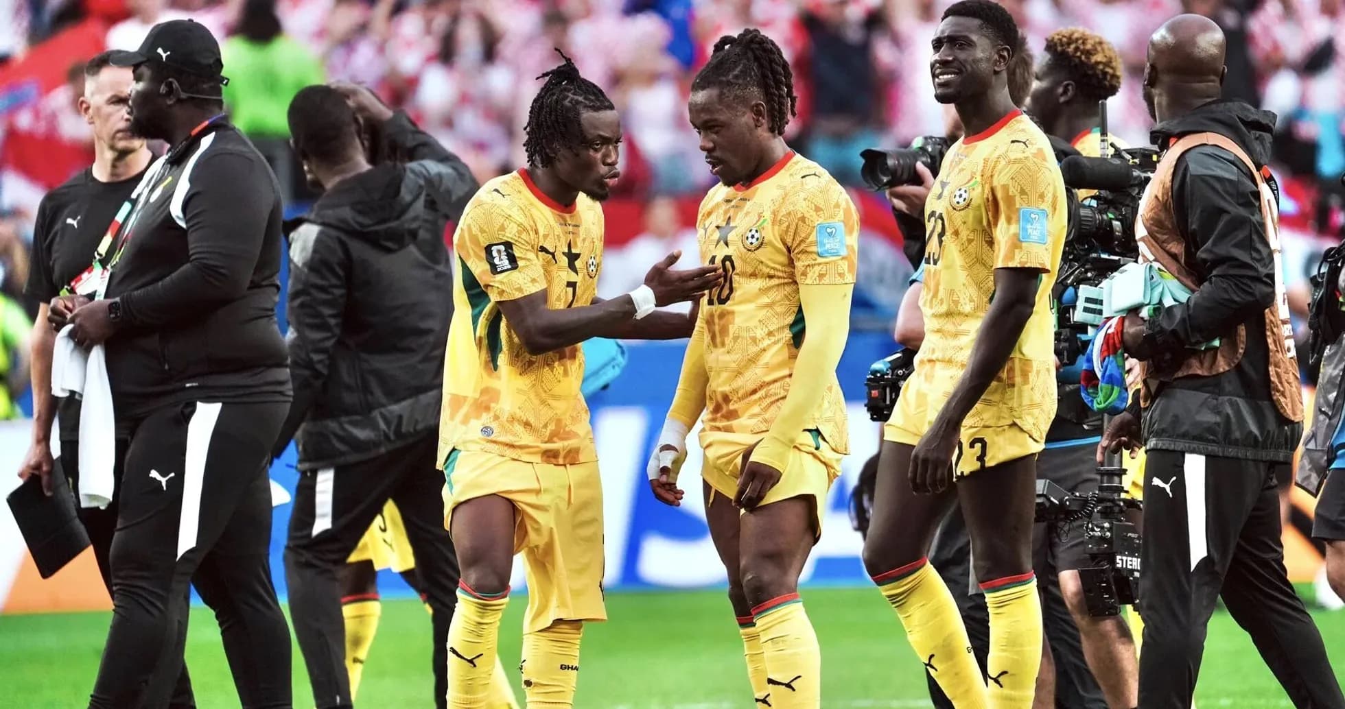 Ghana players discussing strategy during match Ghana players discussing strategy during match